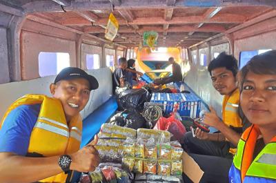 Tim NZMATES menumpangi Speedboat menuju Tahalupu 